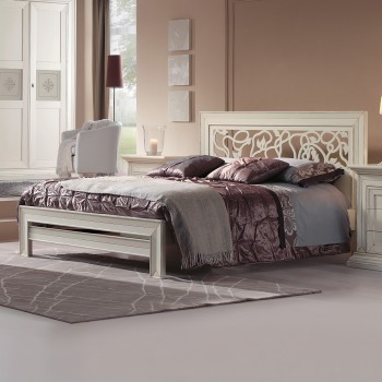 Letto con traforo moderno in legno, testata floreale
