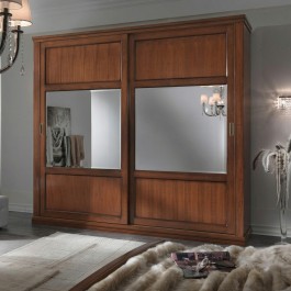 Letto con testata legno traforata in camera moderna