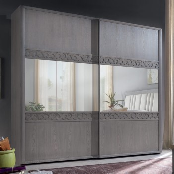 Armadio due ante scorrevoli con specchi e intagli decorativi
