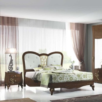 Letto sagomato con griglia centrale e dettagli floreali