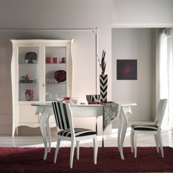 Tavolo da pranzo ovale allungabile ambientato con dettagli