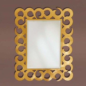 Specchiera finitura in foglia oro con design a vortice