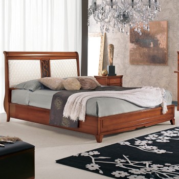 Letto con piedini misura interna 203,5x182, testata imbottita