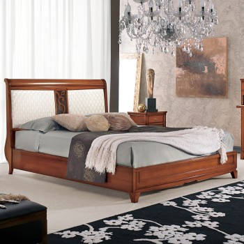 Letto con piedini in legno massello, testata sagomata