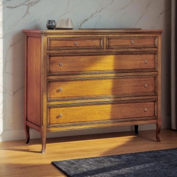 Comò classico in legno con dettagli dei cassetti