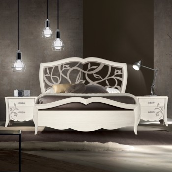Letto matrimoniale in frassino con testata traforata in ambiente moderno