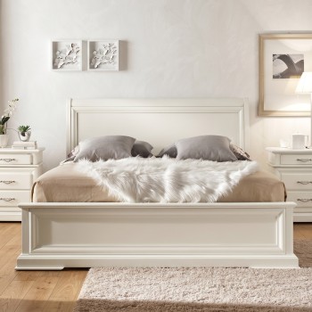 Letto classico in legno massello con testata incorniciata