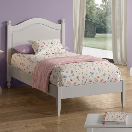 Letto in legno a una piazza con giroletto