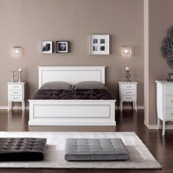 Letto matrimoniale classico con testata lavorata