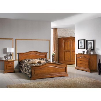 Camera da letto classica sagomata in legno massello