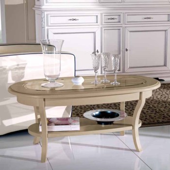 Tavolino ovale con piano in vetro in ambiente classico
