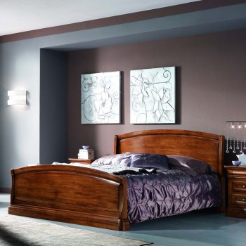 Letto due piazze in legno massello con testata sagomata