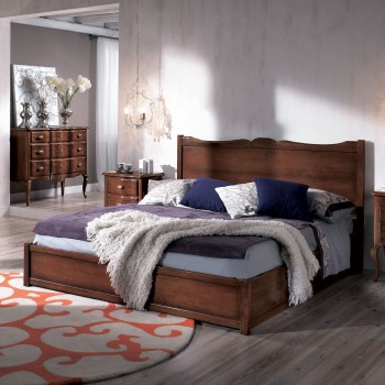 Letto due piazze con testata sagomata in legno massello