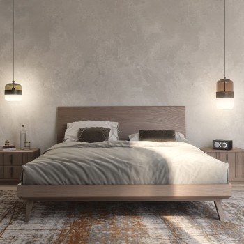 Letto moderno con testata in legno, dettaglio piedini