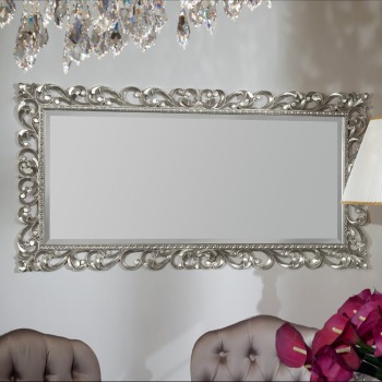 Specchiera intagliata in foglia argento con cornice decorata