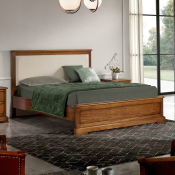 Letto matrimoniale classico con testiera imbottita