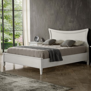 Letto matrimoniale in legno con testata sagomata