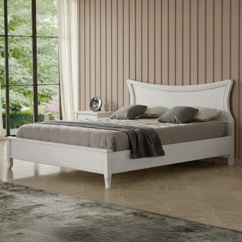 Letto king size in legno con testata sagomata