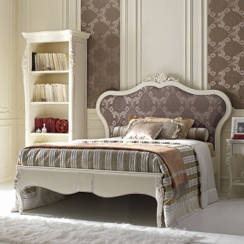Letto una piazza e mezza imbottito classico con testata intagliata